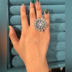 925 Sterling Silver and CZ Ring.  Adjustable size.